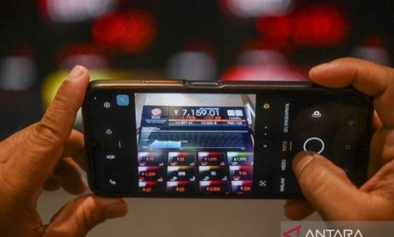 IHSG hari terakhir pekan dibuka menguat 52,08 poin